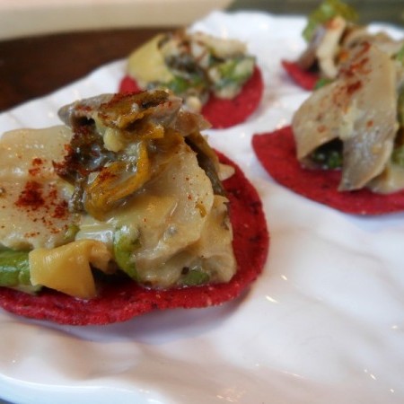 Cheesy Artichoke Dip with Greens, Mushrooms and Water Chestnuts